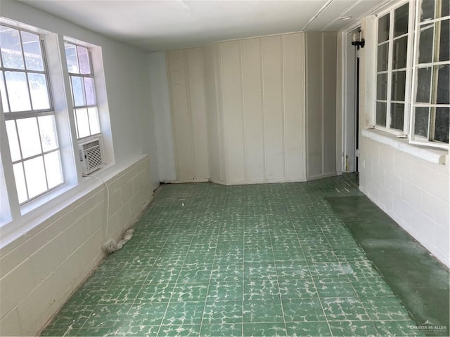 602 E Kelly Ave E, Pharr, TX 78577 - unfurnished sunroom with healthy amount of natural light and cooling unit