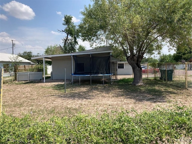 view of yard with a trampoline