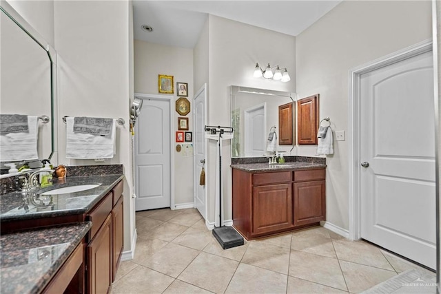 bathroom featuring tile patterned floors and vanity