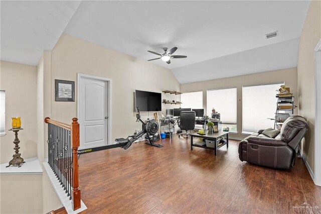 living room featuring ceiling fan, hardwood / wood-style floors, and lofted ceiling