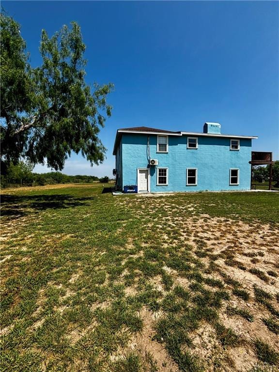 21732 Mile 17 Rd, Edinburg, TX 78541 - back of house with a lawn