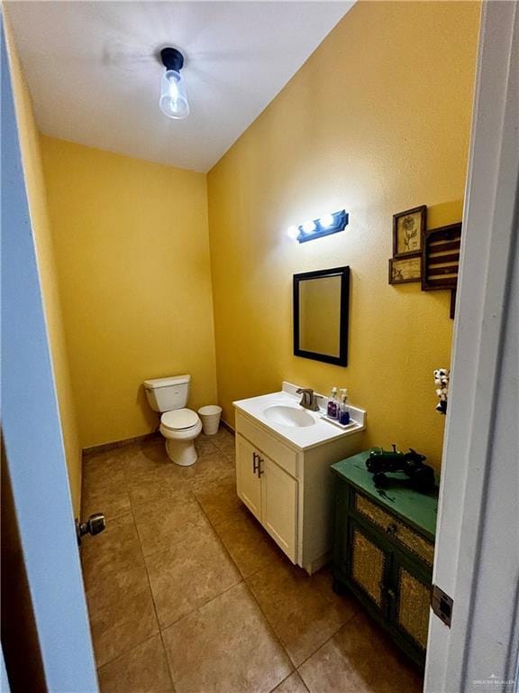 21732 Mile 17 Rd, Edinburg, TX 78541 - bathroom with toilet, tile patterned flooring, and vanity