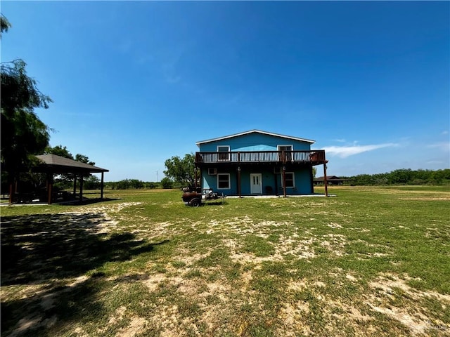 21732 Mile 17 Rd, Edinburg, TX 78541 - back of house featuring a gazebo, a wooden deck, and a lawn