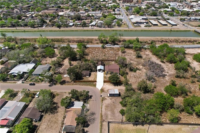 615 Iowa St, Mercedes, TX 78570 - birds eye view of property with a residential view and a water view