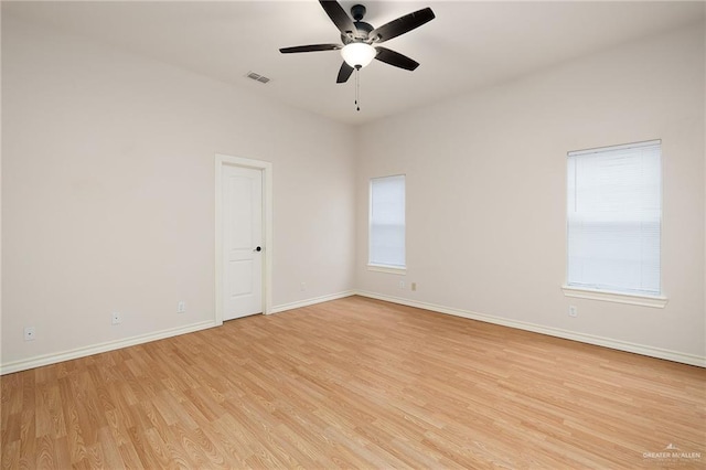 unfurnished room with light hardwood / wood-style floors and ceiling fan