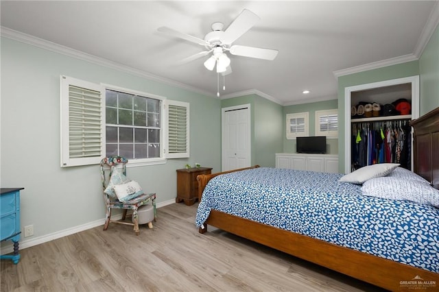 bedroom featuring a ceiling fan, baseboards, ornamental molding, and wood finished floors