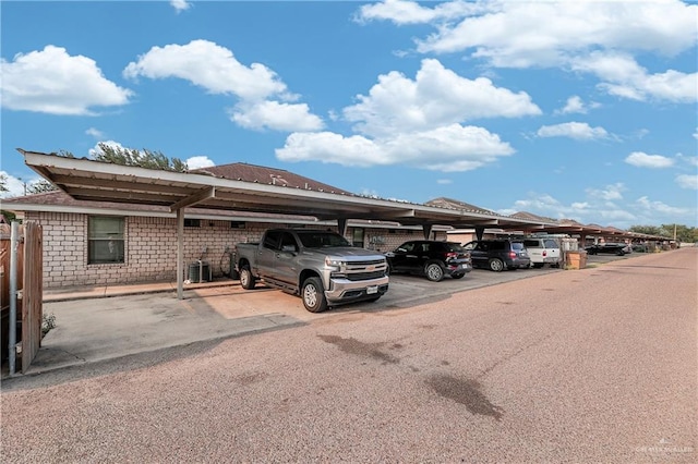 view of parking featuring a carport