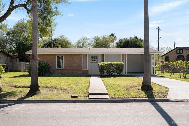 ranch-style home with a front lawn and a carport