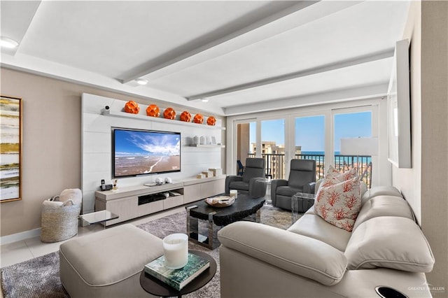 living room featuring light tile patterned flooring and beam ceiling