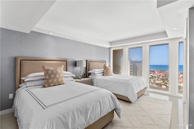 bedroom with a raised ceiling