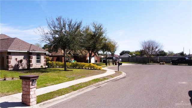 view of street with curbs and sidewalks