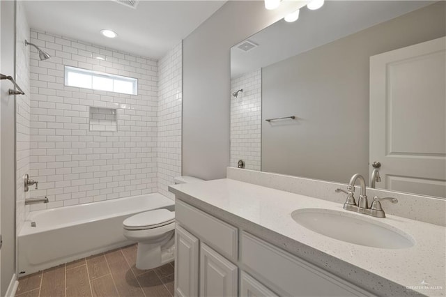 825 S Templo Dorado, Mission, TX 78572 - full bathroom with vanity, toilet, and bathtub / shower combination