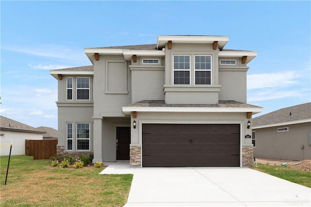 825 S Templo Dorado, Mission, TX 78572 - prairie-style house featuring stone siding, an attached garage, stucco siding, and driveway