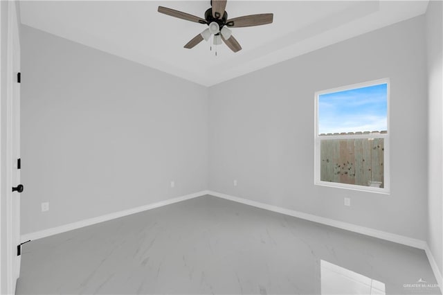 unfurnished room with ceiling fan