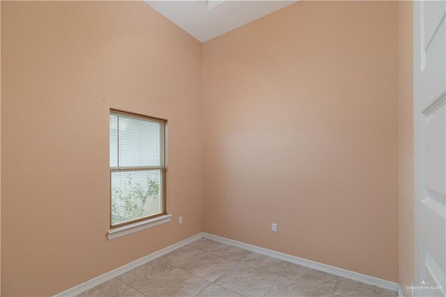 view of tiled spare room