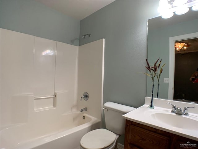 full bathroom with vanity, shower / bath combination, and toilet