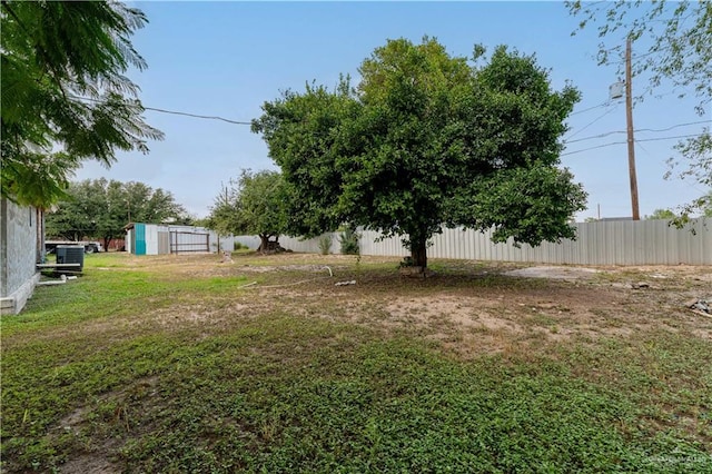 view of yard with central AC