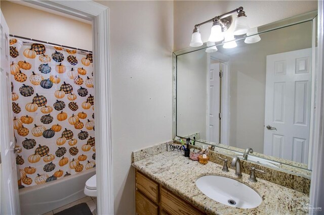 104 El Dora Rd, Alamo, TX 78516 - full bathroom featuring vanity, toilet, and shower / bath combo with shower curtain