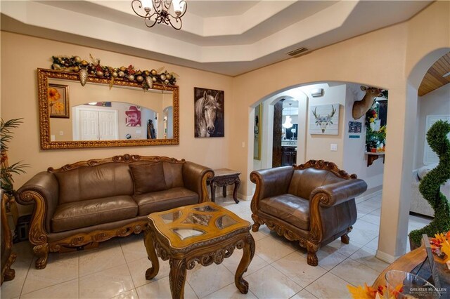 104 El Dora Rd, Alamo, TX 78516 - living room with arched walkways and light tile patterned flooring