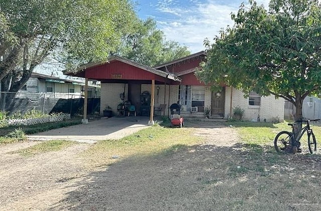 view of front of house featuring a carport