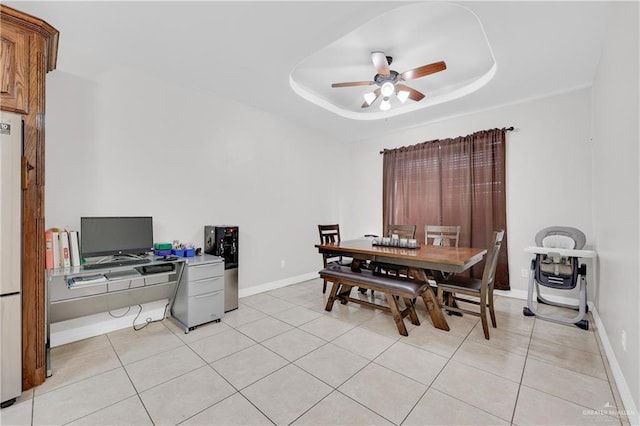 2103 W 30th St, Mission, TX 78574 - dining area with a ceiling fan, a desk, light tile patterned floors, a tray ceiling, and baseboards