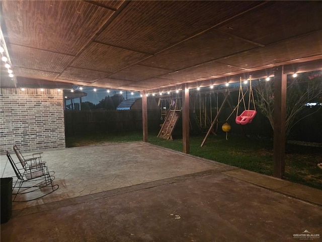 2103 W 30th St, Mission, TX 78574 - view of patio / terrace with a playground and a fenced backyard