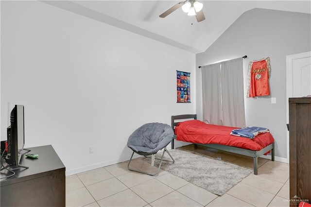 2103 W 30th St, Mission, TX 78574 - bedroom featuring light tile patterned floors, baseboards, a ceiling fan, and high vaulted ceiling