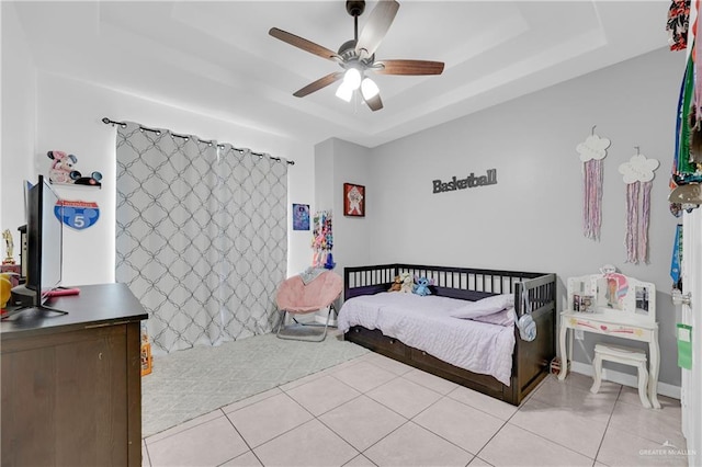 2103 W 30th St, Mission, TX 78574 - bedroom with a tray ceiling, light tile patterned floors, and ceiling fan