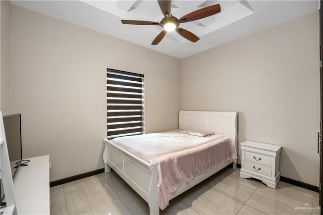 900 E Camelia Ave, Hidalgo, TX 78577 - bedroom with baseboards, light tile patterned floors, and a ceiling fan
