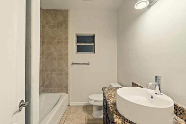 bathroom with tile patterned floors, vanity, and toilet