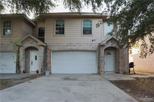 view of front of property with a garage