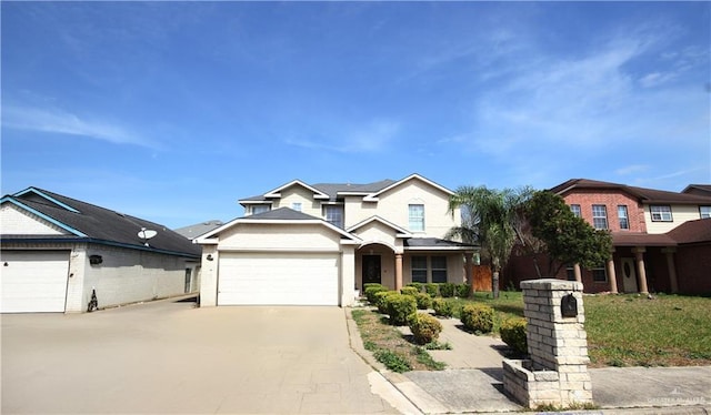 traditional home with driveway and a garage