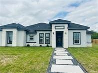 view of front of home featuring a front lawn