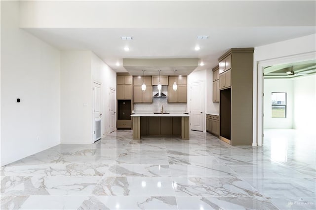 303 N 31st St, Hidalgo, TX 78557 - kitchen featuring wall chimney exhaust hood, light countertops, tasteful backsplash, light marble finish flooring, and open floor plan
