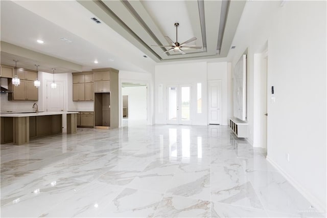 303 N 31st St, Hidalgo, TX 78557 - unfurnished living room with a ceiling fan, recessed lighting, light marble finish floors, and baseboards