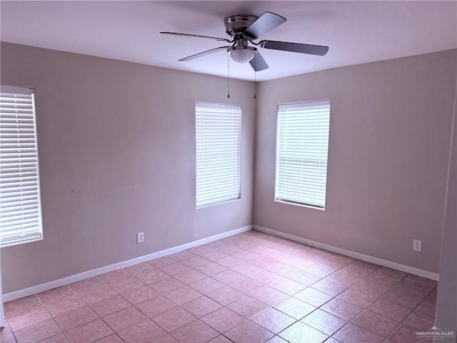 spare room featuring ceiling fan