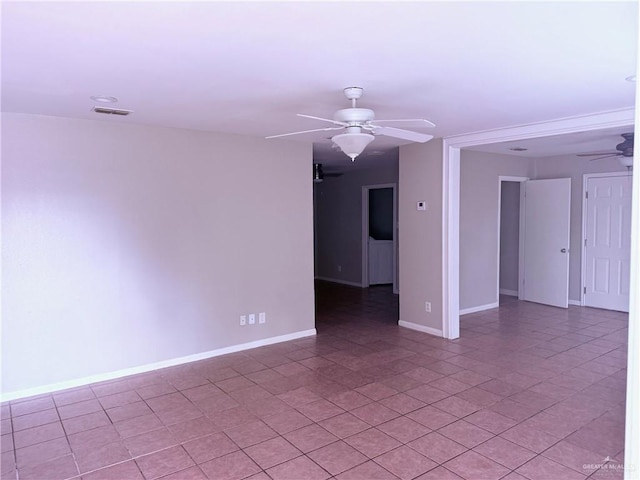 spare room with ceiling fan