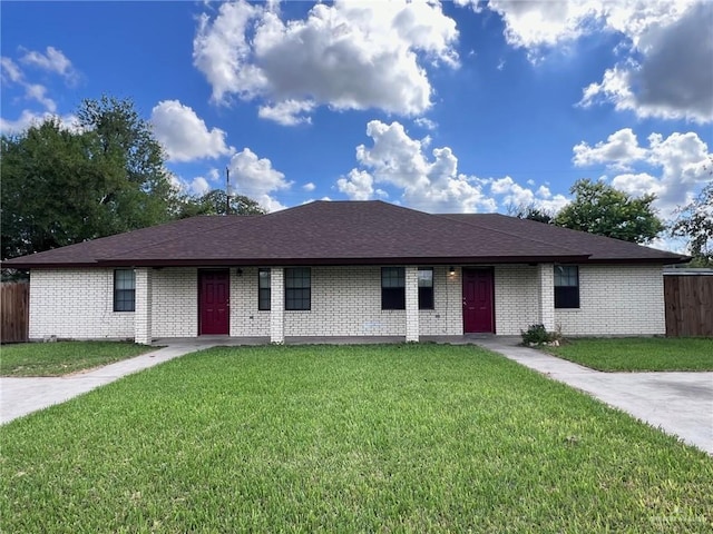 ranch-style home with a front yard