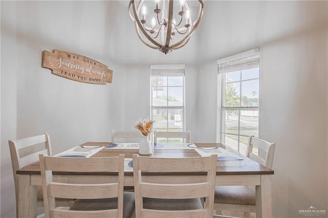 dining space featuring a chandelier