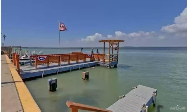 view of dock with a water view