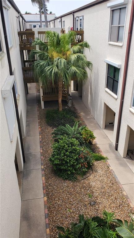 3113 Laguna Blvd Unit 219, South Padre Island, TX 78597 - view of yard with a balcony