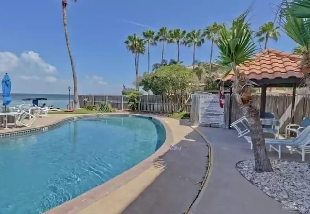3113 Laguna Blvd Unit 219, South Padre Island, TX 78597 - community pool featuring a gazebo and a patio