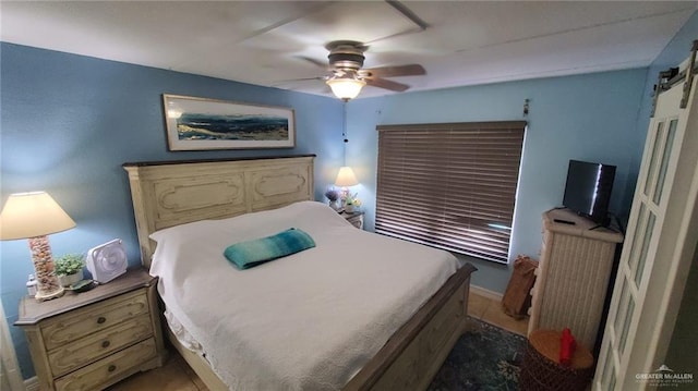 3113 Laguna Blvd Unit 219, South Padre Island, TX 78597 - bedroom with a barn door and a ceiling fan