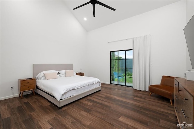 bedroom featuring ceiling fan, dark hardwood / wood-style floors, access to exterior, and high vaulted ceiling