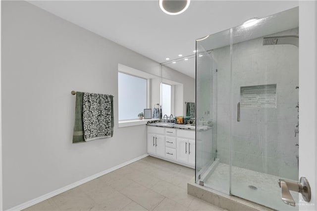 bathroom featuring vanity and walk in shower