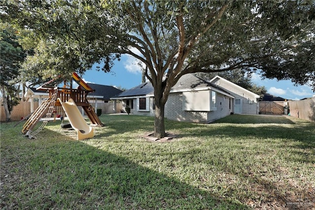 view of yard with a playground