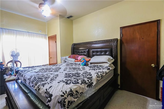 bedroom featuring visible vents