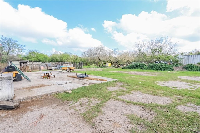 view of yard with fence