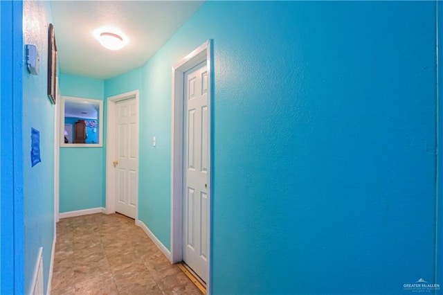 hallway with baseboards