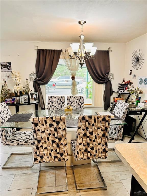 dining space featuring an inviting chandelier